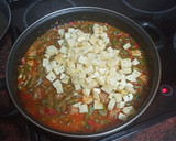 Foto del paso 9 de la receta: Habichuelas compuestas con carne de cochino, papas fritas y huevo duro