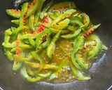 A picture of step 3 of Uchhe-Kumro Chenchhki Kasundi diye (Karela-Kumra dry with Kasundi).
