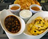 A picture of step 1 of Chana Chola, omellete and paratha.