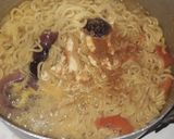 A picture of step 3 of Indomine vegetables.