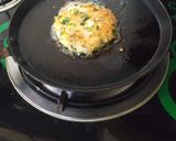 A picture of step 2 of Masala patty Bun sandwich.