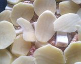 Foto del passaggio 5 della ricetta Carciofi e patate a sfincione