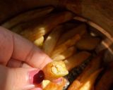 صورة لخطوة 5 من وصفة بطاطس مقرمشة ومفرغة من الداخل 🍟