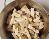 A picture of step 1 of Thyme Cream of Celeriac Soup with Crushed Peanuts.