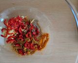 A picture of step 1 of Singapore style pork noodles.