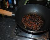 A picture of step 3 of Persian Pomegranate Rice with Pistachio and Raisins.
