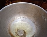 A picture of step 7 of வெள்ளைப்பூண்டு குச்சி கருவாட்டு குழம்பு.