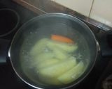 Foto del paso 4 de la receta: Merluza empanada con papas cocidas, zanahoria y huevo duro