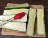 A picture of step 2 of Zucchini Pizza Boats.
