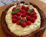 A picture of step 7 of Flourless chocolate cake with raspberries and cream.