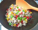 A picture of step 2 of Mexican-Style Fried Rice with Chili Powder.