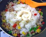 A picture of step 3 of Mexican-Style Fried Rice with Chili Powder.
