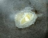 A picture of step 1 of Butter garlic Murmura.