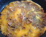A picture of step 4 of Easy Chicken Soboro Oyakodon (Chicken and Egg Rice Bowl).
