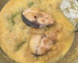 A picture of step 4 of Coconut milk fish.