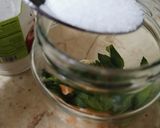 A picture of step 2 of Orange Mojito 🍊.