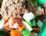 A picture of step 4 of Cucumber tomatoes salad.