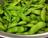 A picture of step 1 of The Best Way to Boil Edamame with Just 1/2 Cup Water.
