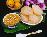 A picture of step 10 of Mango Kheer and Puri.