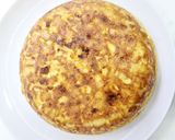 Foto del paso 4 de la receta Tortilla de patata rellena de jamón y queso