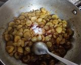 A picture of step 3 of Jhatpat khata meetha amla.