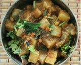 A picture of step 9 of Brinjal Raw banana gravy.