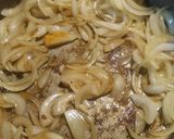 A picture of step 4 of Saucisses Soubise /Sausage Cooked in onion sauce.