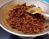 A picture of step 4 of Rajma Masala and Jeera Rice.