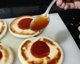 A picture of step 2 of Cheesy Pizzetta.