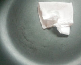 A picture of step 3 of Stick egg net sausage.