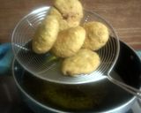 A picture of step 20 of Palak kachori with corn- paneer stuffing.
