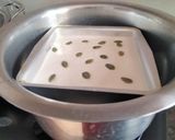 A picture of step 4 of Sandwich dhokla.