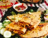 A picture of step 14 of Leftover roti panini leftover roti sandwich.