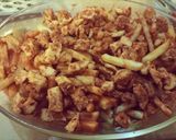 A picture of step 3 of Loaded fajita fries.