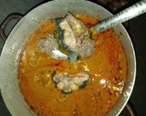 A picture of step 6 of Banga soup with fresh cat fish and beef.