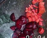 A picture of step 2 of Orange Beetroot and Carrot Juice.