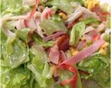 A picture of step 4 of Kids Love It! Lettuce and Imitation Crab Mayo Salad.