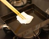 A picture of step 2 of Fluffy Japanese Rolled Omelet with Shirodashi.