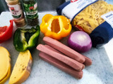 Penne con pimientos rojos, verdes y amarillos