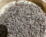 A picture of step 1 of Cumin Rice.
