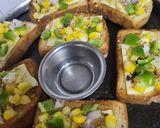 A picture of step 5 of Corn 🌽 Capsicum 🫑 Cheesy Toast.