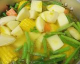 A picture of step 3 of Mole de Olla.
