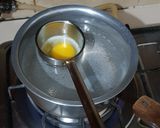 A picture of step 2 of Ladle egg, better than poached egg!.