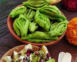 A picture of step 7 of Green karela chaat.