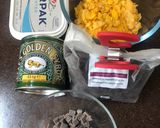 A picture of step 1 of Chocolate cornflake & raisin cakes.