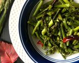 A picture of step 4 of Asparagus Upkari/Stir Fry with Mustard and Chilies.