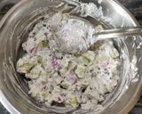A picture of step 2 of CUCUMBER ONION SALAD with HERBED HUNG CURD...