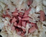 A picture of step 3 of Sweet and sour cabbage with hotdogs.