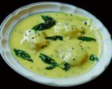 A picture of step 9 of Green Squash (Lauki) paruppu urundai More kuzhambu (in buttermilk sauce).