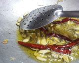 A picture of step 3 of Andhra Tomato pickle.